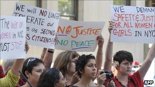 Protesters chanted slogans and waved placards outside the court