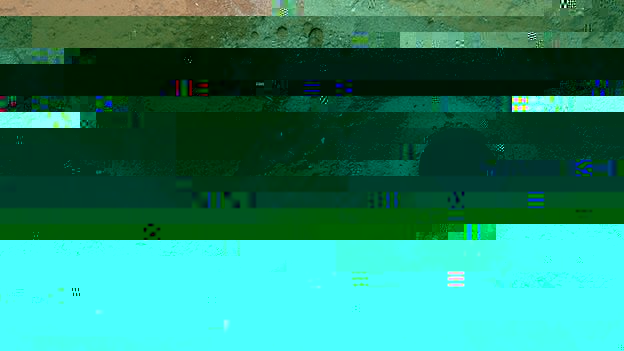 The two holes drilled at John Klein. The test hole (R) is 16mm wide and 20mm deep. The sample hole (L) is 64mm deep. A volume of the grey powder has been picked up and will be sent for analysis